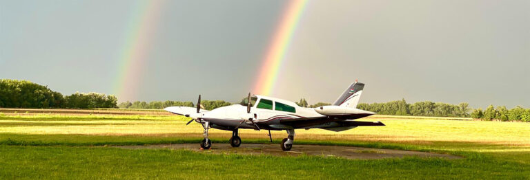 Cessna 310 with Rainbows